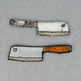 front and back for meat cleaver patches on gray felt background